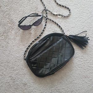 Purse  with silver tone chain strap and sungasses